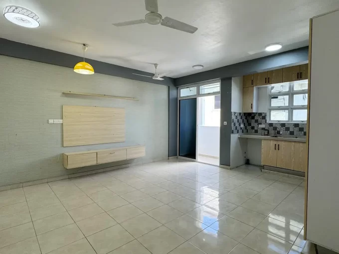 Unfurnished 3 bedroom apartment on the 4th floor of a residential building in Buruzu Magu, Macchangoalhi, Male'. A photo of the living area.