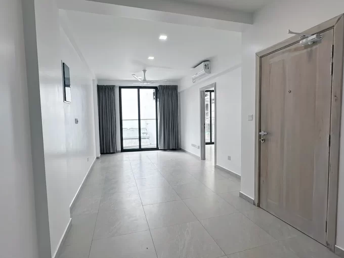 Brand new 3 bedroom apartment in Fiyaathoshi Magu, Maafannu, Male' on the 3rd floor of a residential building. A photo of the living area and main entrance.