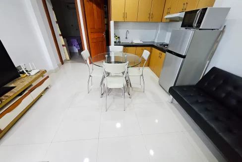 Fully furnished 2 bedroom apartment from a residential building in Halaveli Magu, 3rd floor, Hulhumale' Phase 1. A photo of the living room, dining area and kitchen.