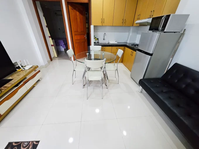 Fully furnished 2 bedroom apartment from a residential building in Halaveli Magu, 3rd floor, Hulhumale' Phase 1. A photo of the living room, dining area and kitchen.