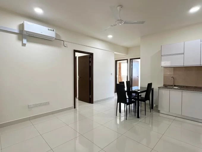 Semi furnished 3 bedroom apartment in One Central Park, 10th Floor, Hulhumale'. A photo of the living area, dining area and kitchen.