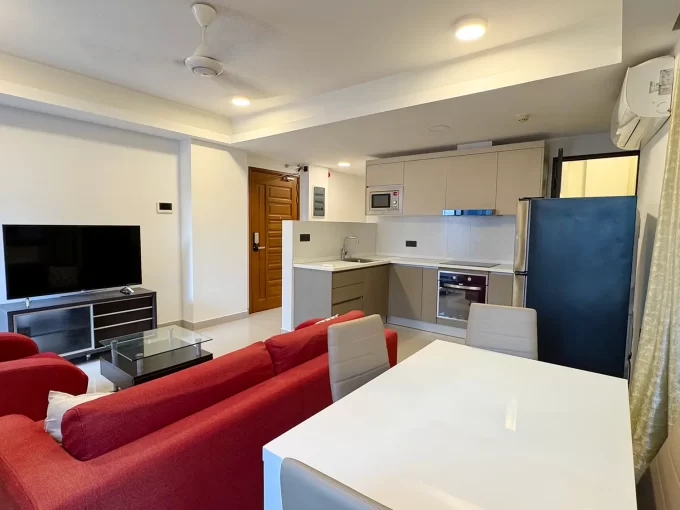 Fully furnished 2 bedroom luxury apartment in Manaage Residence, 5th Floor, Maaveyo Magu, Male'. A photo of the living area, dining area and open kitchen.