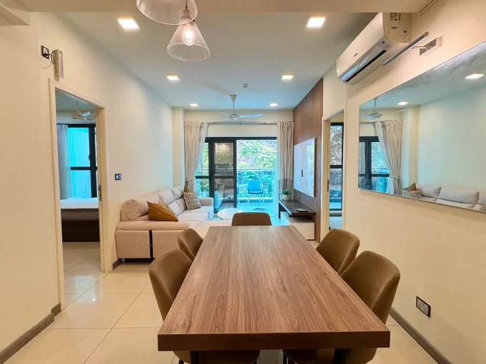 Fully furnished 3+1 bedroom apartment in Damas One Avenue, 2nd Floor, Hulhumale'. A photo of the dining area, living area and private terrace balcony.